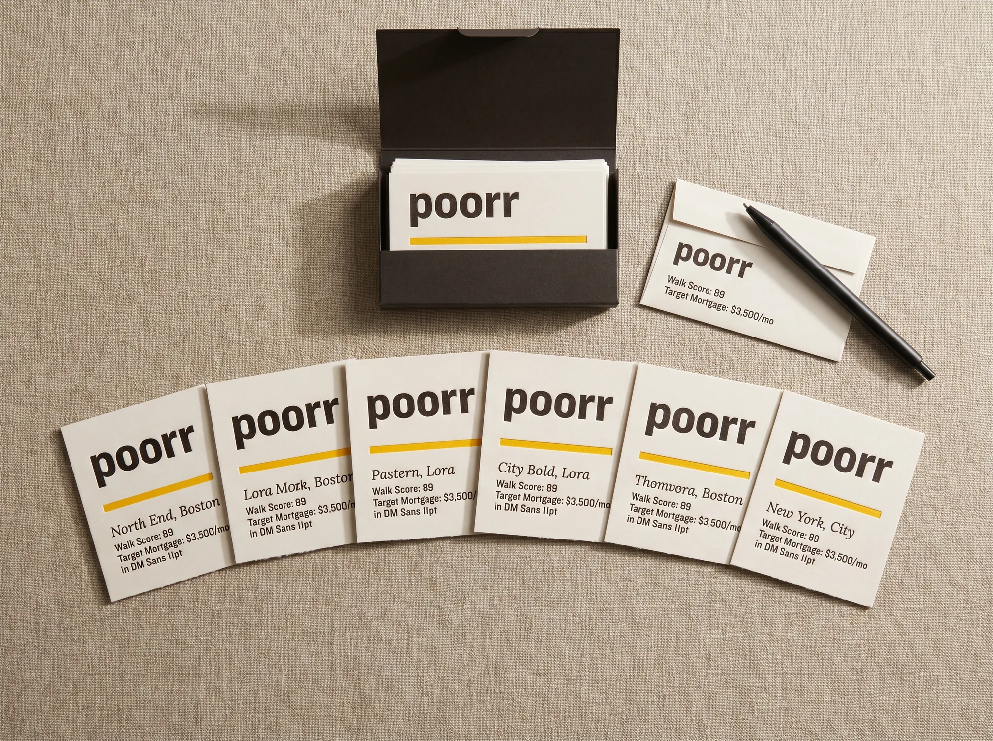 Poorr First-Home Card Set (Stationery) — A flat case of fifty letterpress first-home-shopping cards — wordmark, neighborhood-name line, walk-score row, target-mortgage row, single citrus rule.
