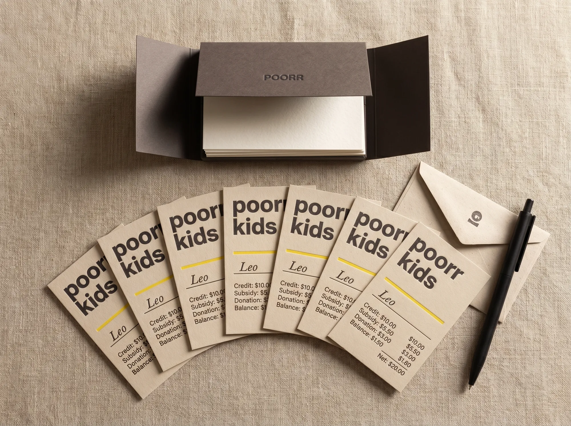 Poorr Family Card Set (Stationery) — A flat case of fifty letterpress true-cost cards — wordmark, child-name field, four credit/subsidy rows, dollar net field, citrus rule.